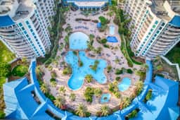 Palms of Destin| 9th flr Jr Suite|Lagoon Pool View